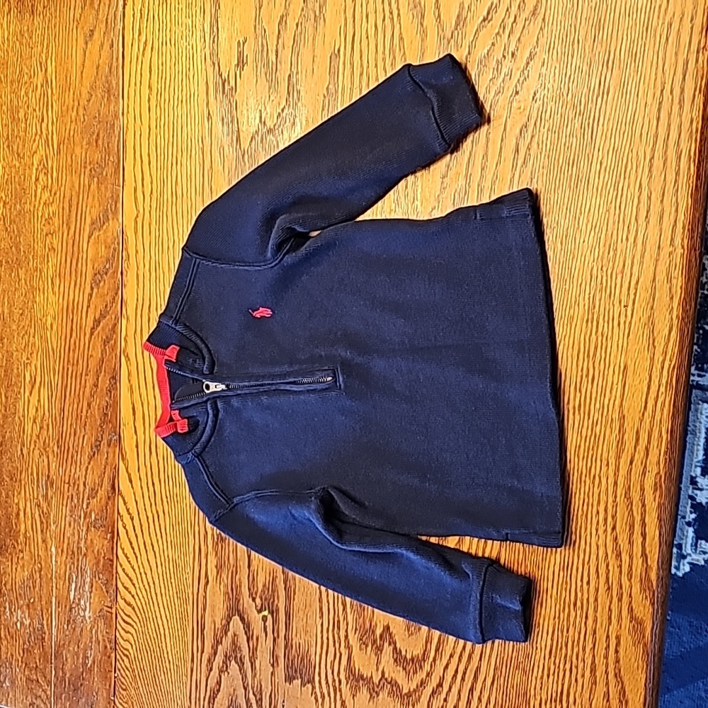 Ralph Lauren zip front sweater.  Size 24m. Navy with red trim.